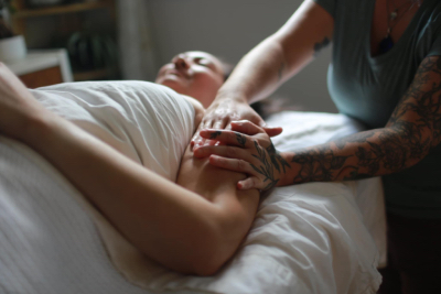 Marissa performing an arm massage